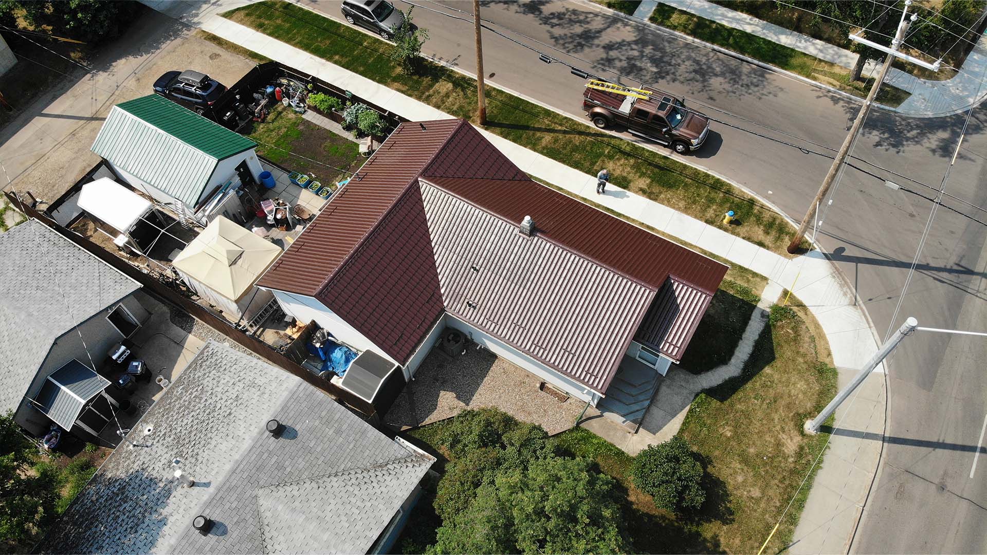 European metal tile roof in Euro Brown finish by IronWrap